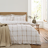 Oxton duvet cover set in natural on bed image 1