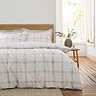 Oxton duvet cover set in natural on bed image 1