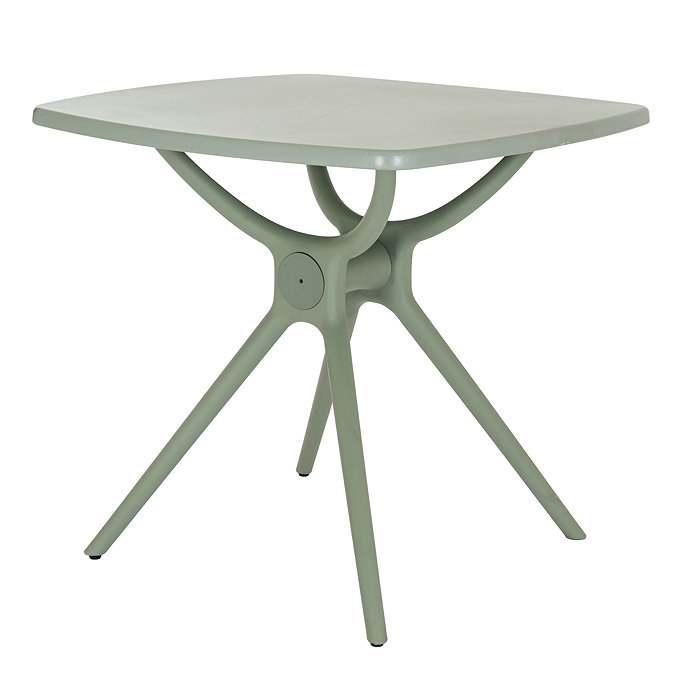 side on image cut out on white background of french grey plastic dining table