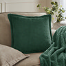 Pascoe Faux Fur Cushion Emerald on Cream Chair