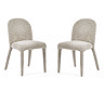 image cut out on white background of beige chenille dining chair pair