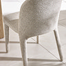image of back of beige chenille dining chair