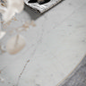 close up image of white marble dining tabletop