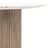 close up image taken mid-level of robbed mango wood dining table with marble tabletop