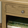 close up image of oak 1 drawer bedside table with small metal handle