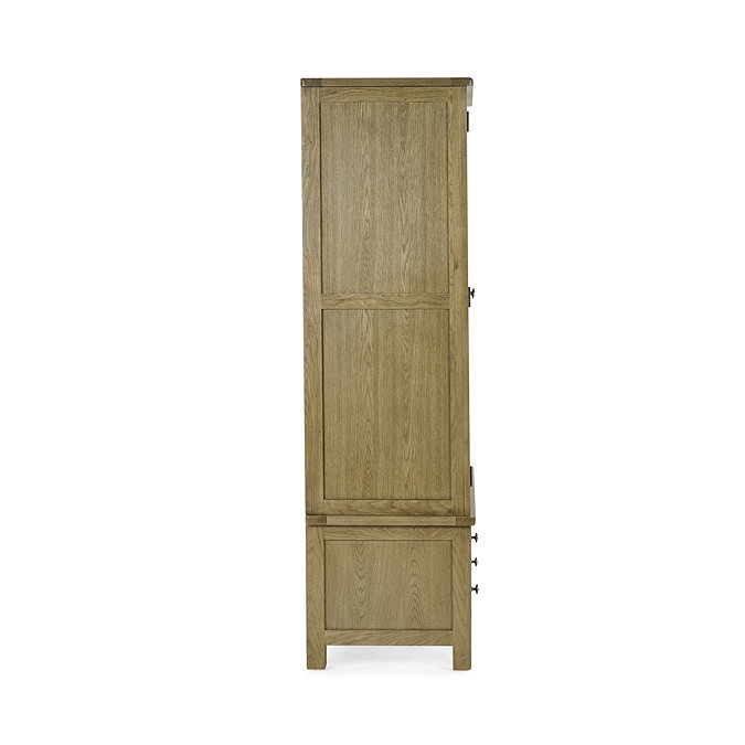 side on image cut out on white background of solid oak wardrobe