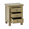 image cut out on white background of solid oak bedside table with three drawers open