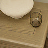 close up on solid wood top of oak bedside table, showing natural wood grain