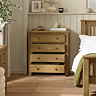 image of solid oak 4 drawer chest with drawers pulled out, in bedroom