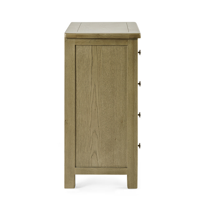 side on image cut out on white background of solid oak 4 drawer chest 