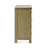 side on image cut out on white background of solid oak 4 drawer chest 