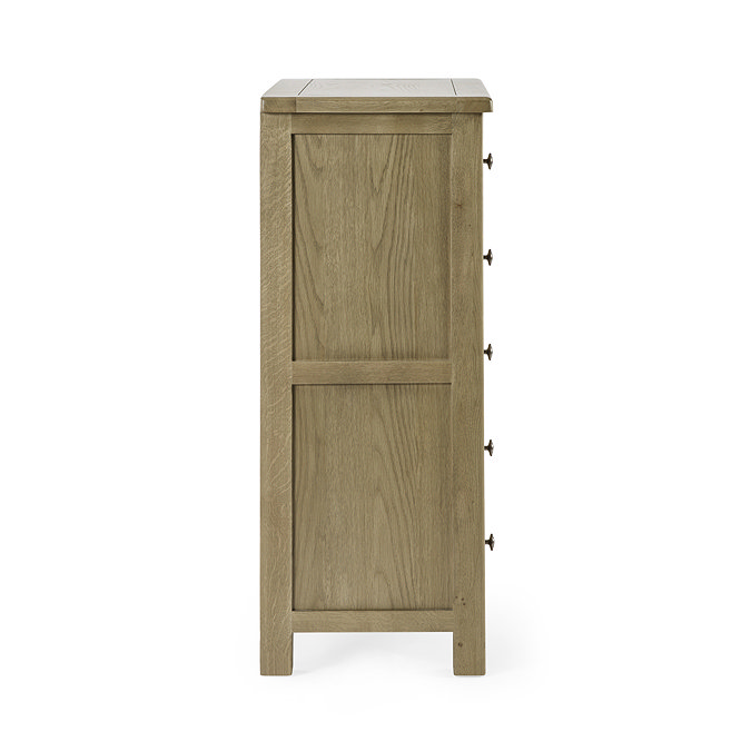 side on image cut out on white background of solid oak 6 drawer chest