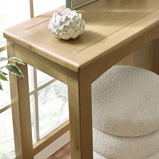 close up on solid oak wooden top of dressing table with smooth corner