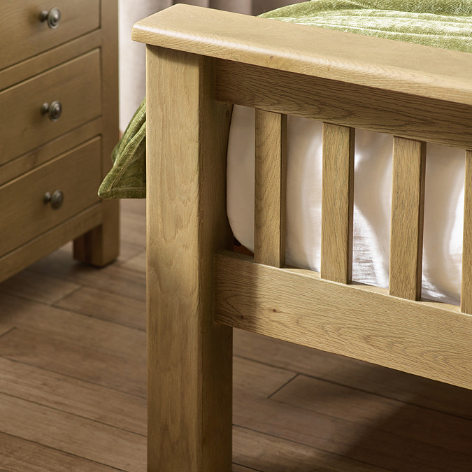 close up image of solid oak slatted footboard of bed