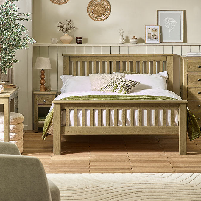 image of slatted solid oak bed in modern country bedroom