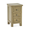 image cut out on white background of slim three drawer bedside table