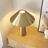 image taken from above looking down on brushed brass table lamp