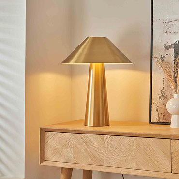 image taken from above looking down on brushed brass table lamp