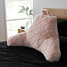 Cosy Diamond cuddle chair cushion in blush on bed image 1
