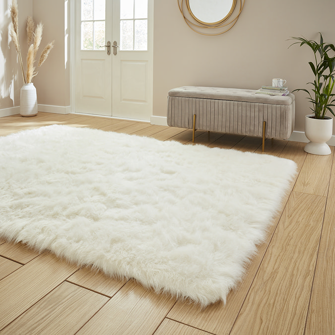 Polar plush ivory rug on floor image 2