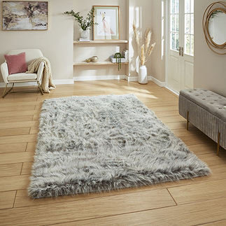 Polar plush light grey rug on floor image 1