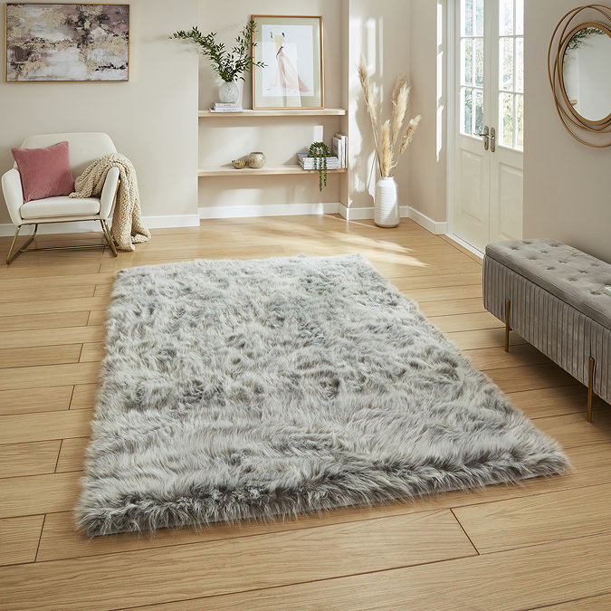 Polar plush light grey rug on floor image 1