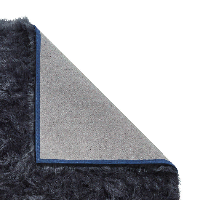 Polar plush navy rug close up image