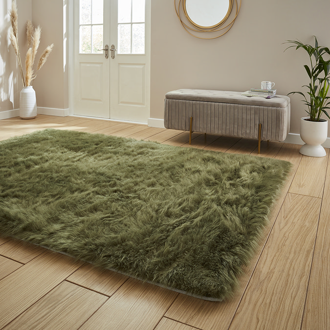 Polar plush green rug on floor image 2