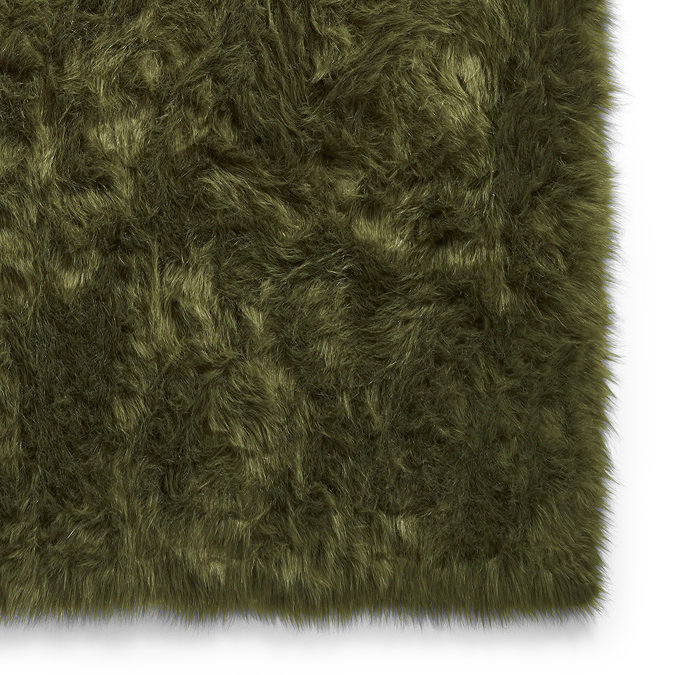 Polar plush green rug close up image 5