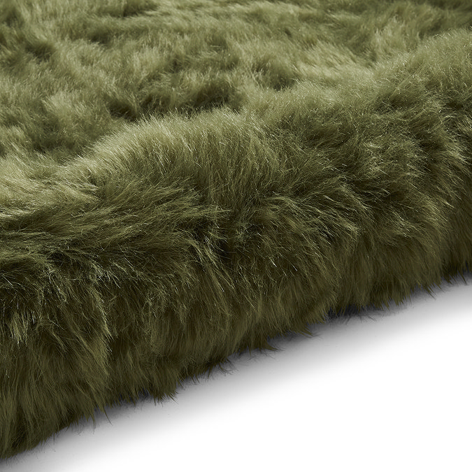 Polar plush green rug close up image 9