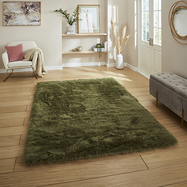 Polar plush green rug on floor image 2