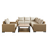 image cut out on white background of chunky rattan garden corner sofa with matching table