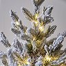 close up image of snowy branches, lit with tiny warm white LEDs