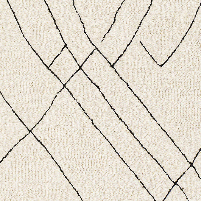 close up swatch image of cream rug with black abstract lines