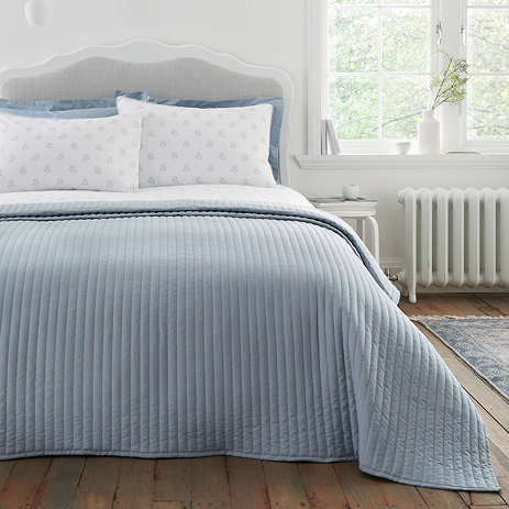 quilted lines bedspread blue