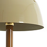 close up on beige iron shade of brown mid-century lamp with glossy sheen