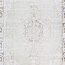 close up image of light sage floral vintage rug