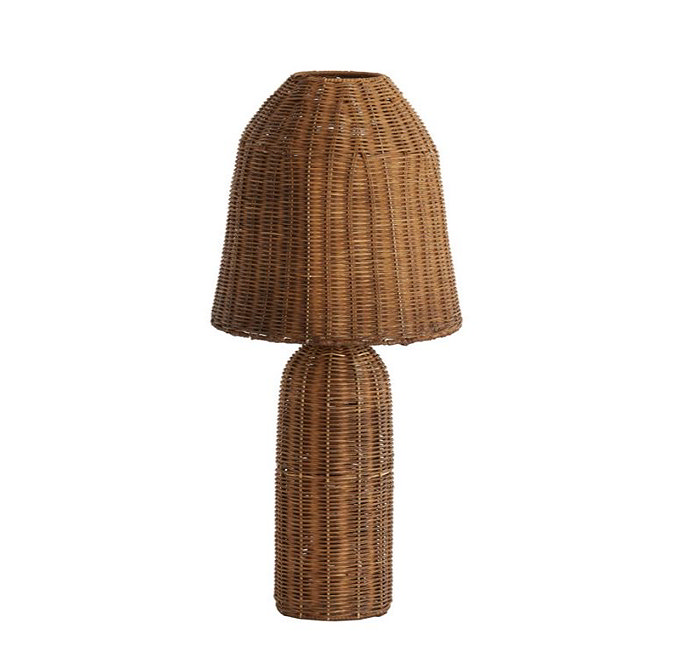 image cut out on white background of brown rattan lamp with elongated domed shade