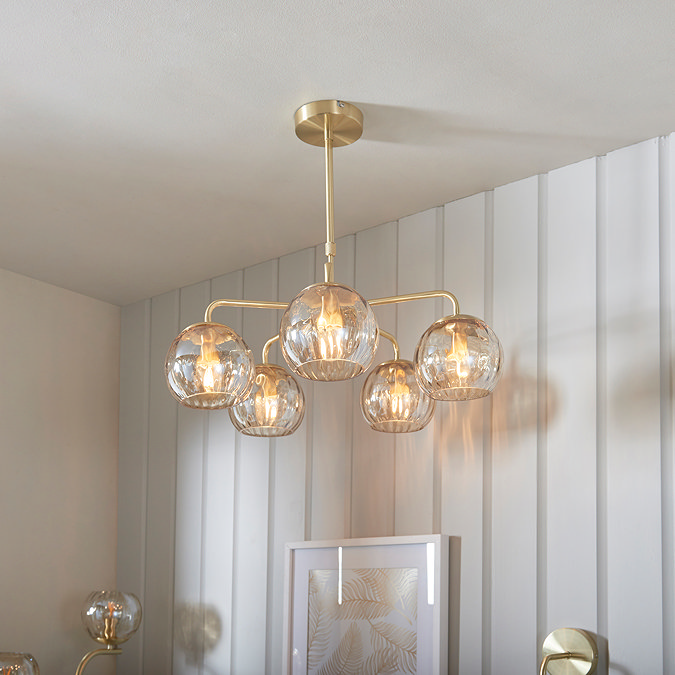image of five pendant dimpled glass lights in champagne colour