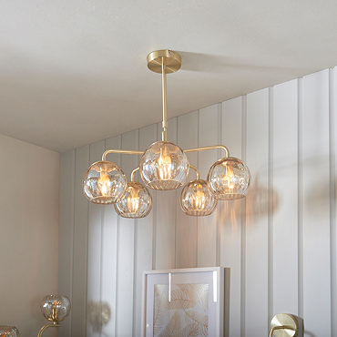 close up on dimpled glass champagne coloured shades of ceiling light
