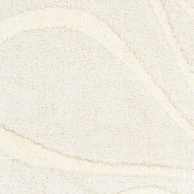 close up image on embossed texture of cream lined soft rug