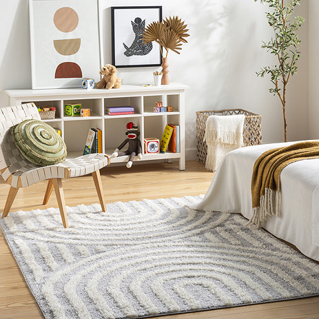 image of rectangular soft grey rug with arched line pattern on either side+