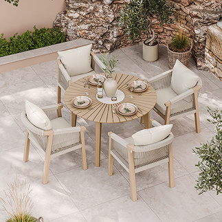 image taken from above of round dining set in acacia wood with woven rope dining chairs