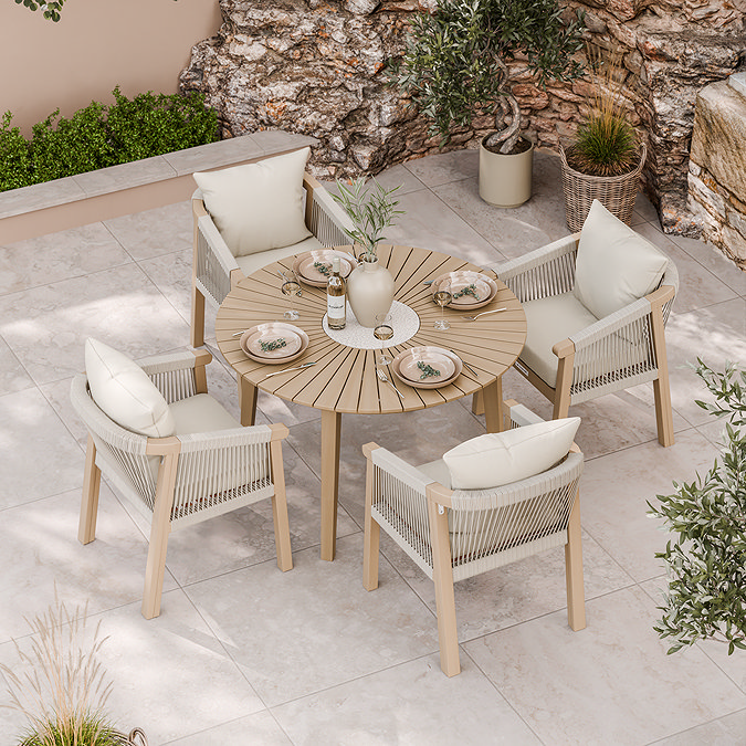 image taken from above of round dining set in acacia wood with woven rope dining chairs