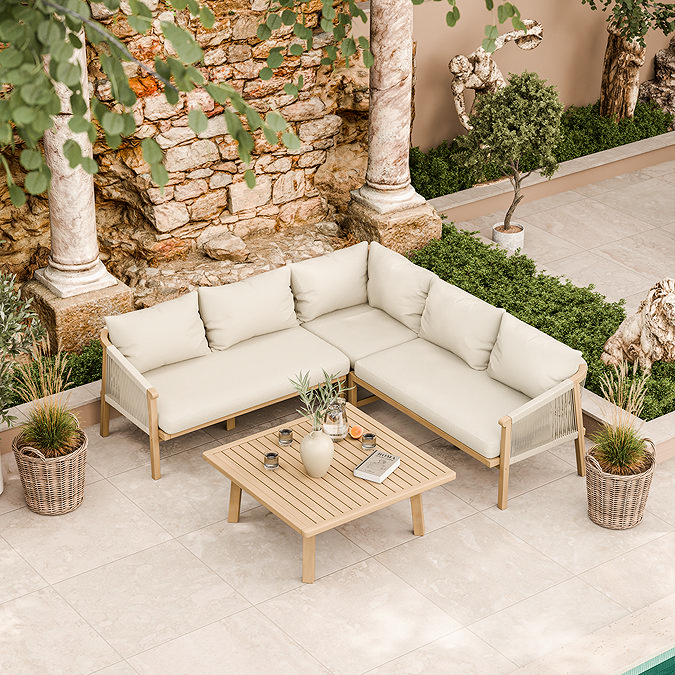 image taken from above of beige acacia wood corner lounge set with wooden coffee table on stone patio