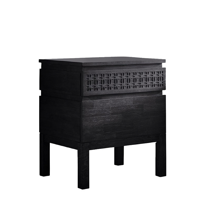 cut out of black wooden bedside table with bohemian patterned top drawer