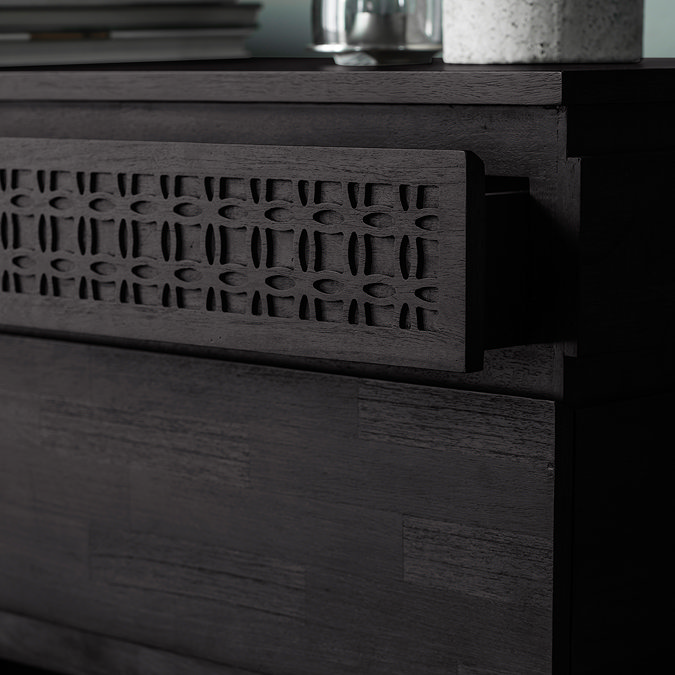 close up on top thin drawer of chest, with bohemian pattern, slightly open