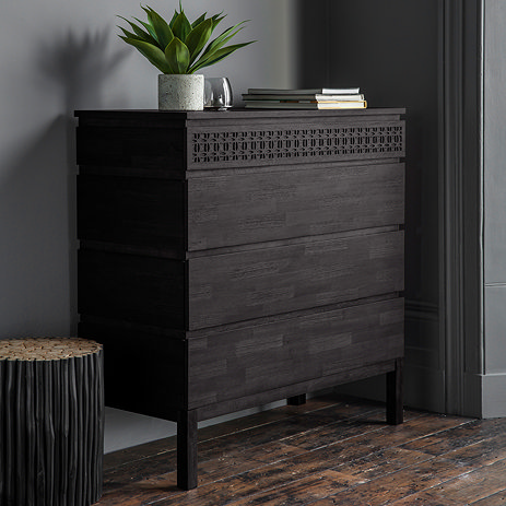 image of four drawer chest in black, featuring bohemian pattern on top drawer