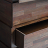 close up image of brown chest drawer pulled open