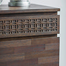 close up image of frieze on top drawer of brown 4 drawer chest